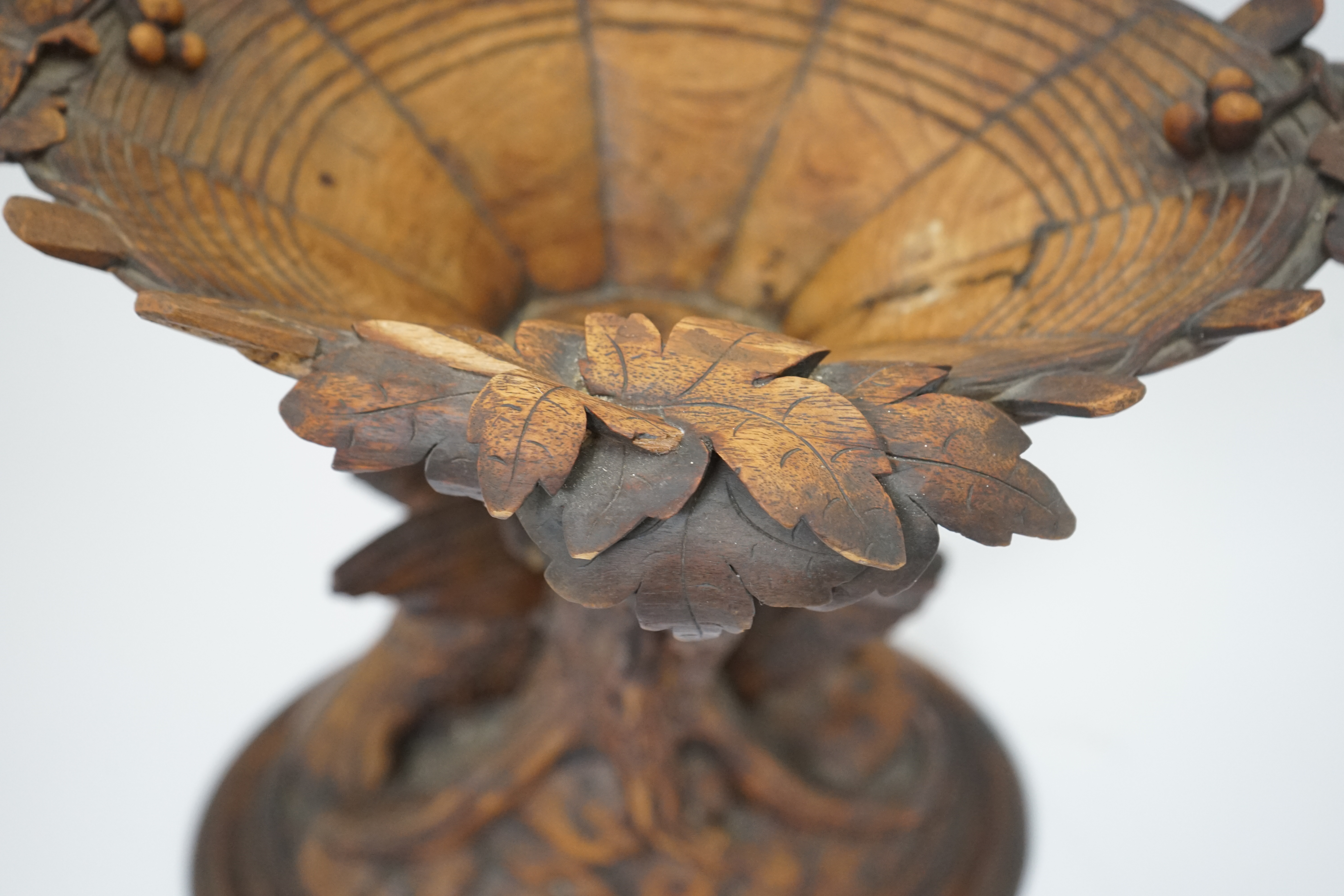 A 19th century Black Forest carved wood centrepiece